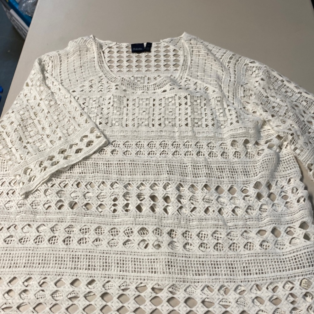 Two piece off white lace cut out blouse with white spaghetti tank underneath